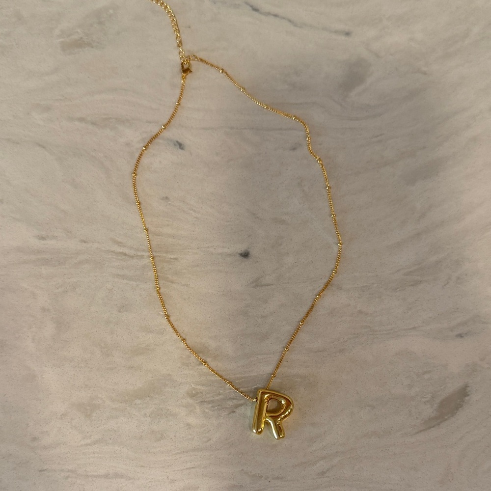 Gold “R” bubble necklace